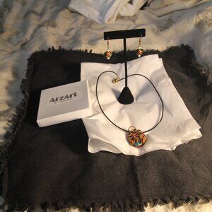 Resin necklace & matching earrings with copper findings. Used condition.